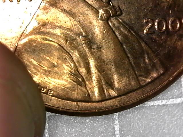 2009-LBC-Obverse-Die-Break