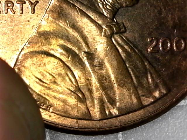 2009-LBC-Obverse-Die-Break