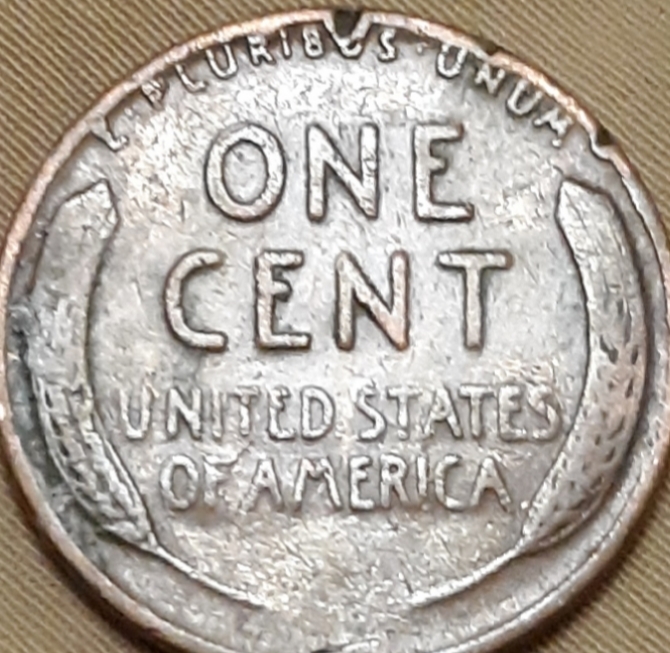 Some-Kind-Of-Rim-Error-On-A-1944-Lincoln-Wheat-Cent