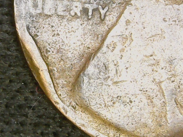1911-Penny-Strike-Through-On-Face