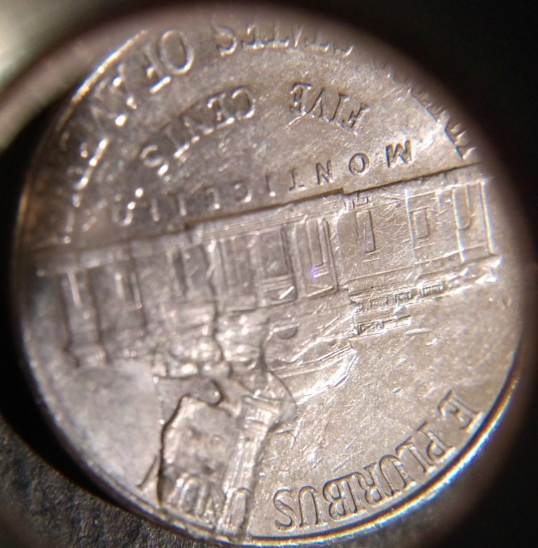 Penny-Struck-Over-1998-D-Nickel?