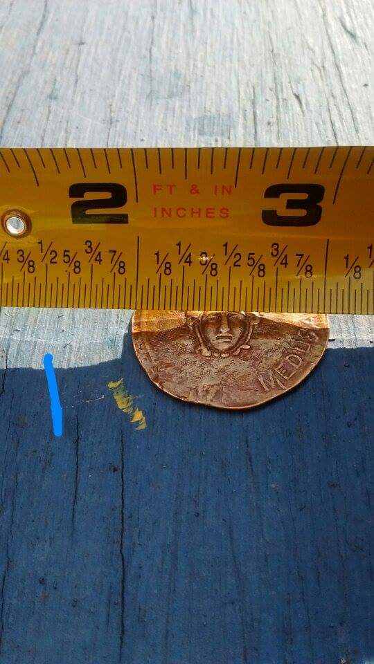 Mystery-Coin-Found-In-Largent,-West-Virginia
