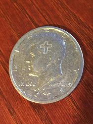 Kennedy-Half-Dollar-With-A-Cross?