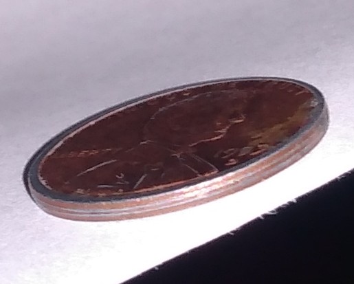 Anyone-Know-Why-The-Rim-Of-This-1993-D-Penny-Looks-Silver?