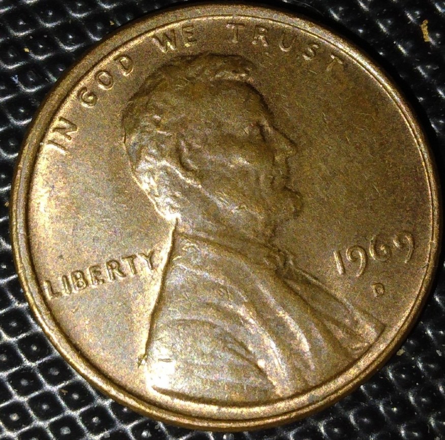 What-Is-This-Crack-Or-Line-Down-The-Back-Of-Lincolns-Neck-And-Back-On-This-1969-D-Penny?