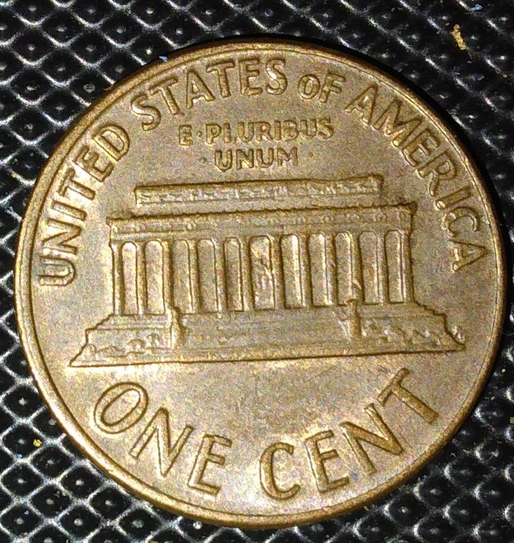 What-Is-This-Crack-Or-Line-Down-The-Back-Of-Lincolns-Neck-And-Back-On-This-1969-D-Penny?
