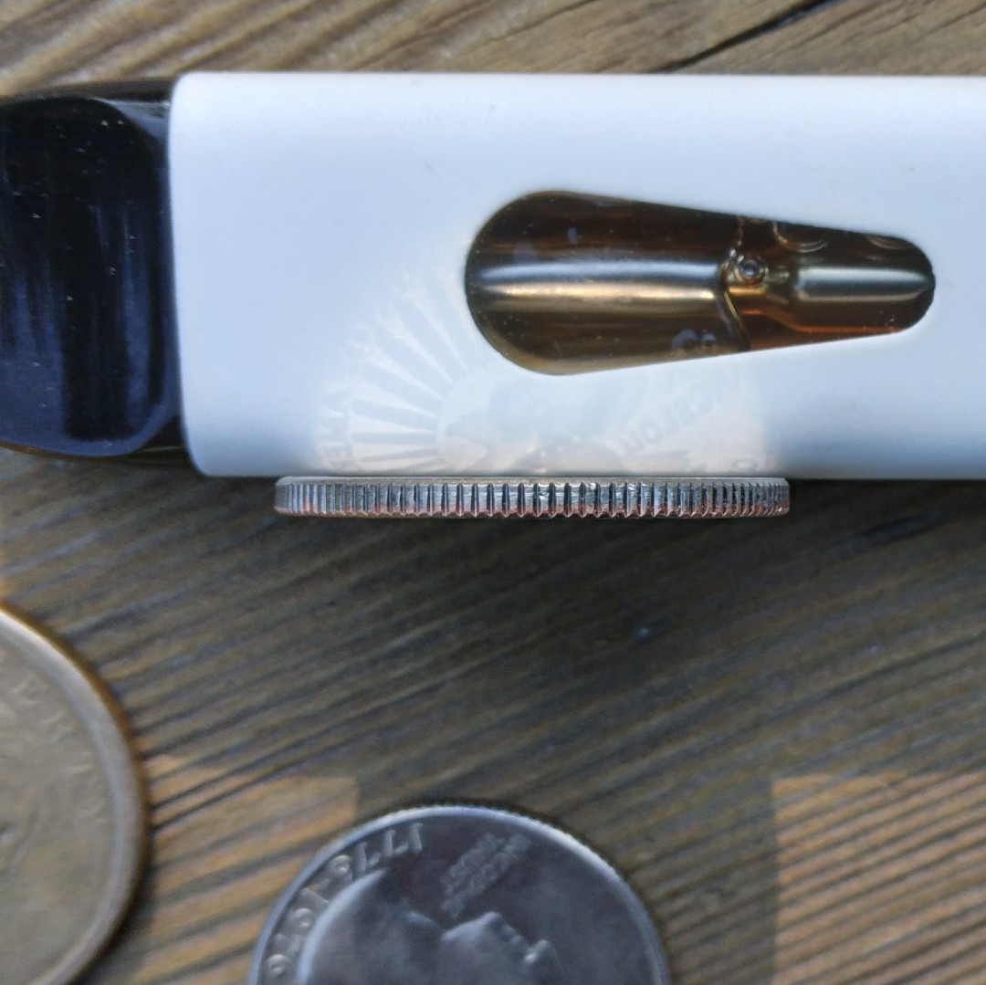 Is-This-2022-D-Quarter-DDO--Plus-Has-A-Little-Copper-Around--Edge-But-Almost-Full-Silver-Band?