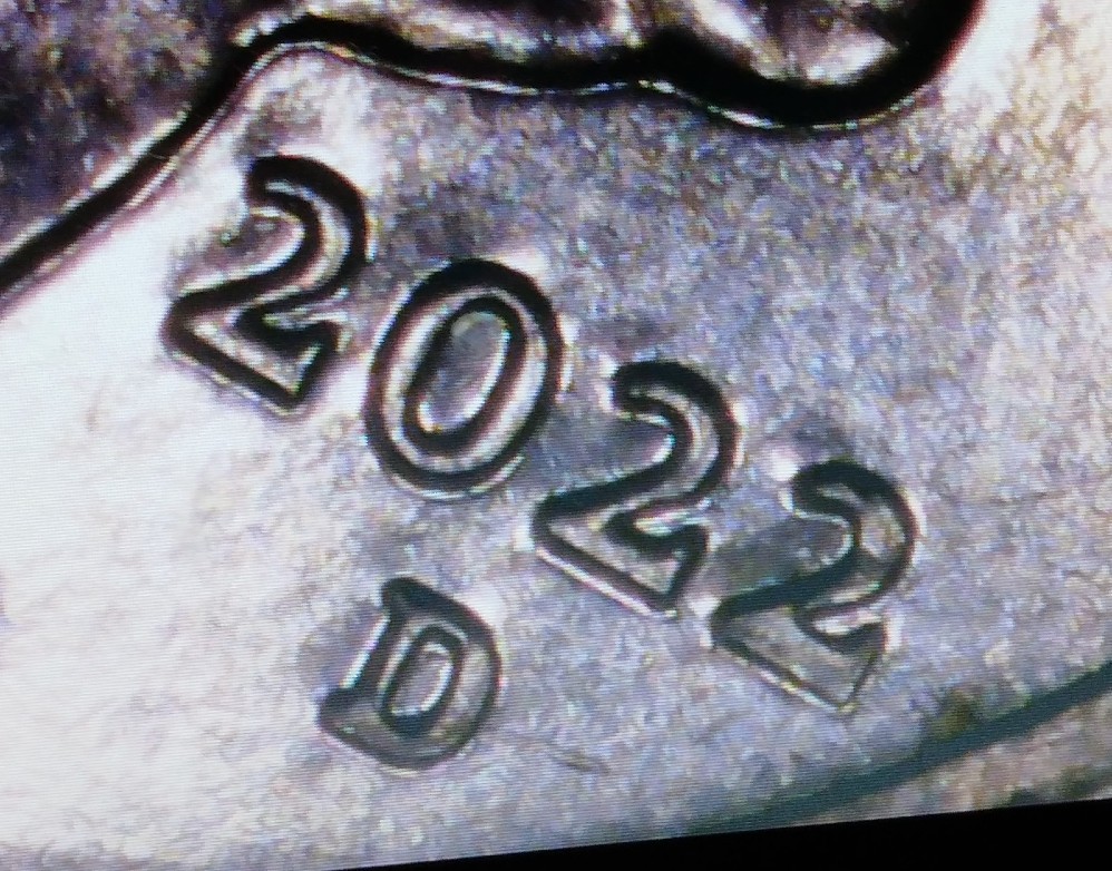 Is-This-2022-D-Quarter-DDO--Plus-Has-A-Little-Copper-Around--Edge-But-Almost-Full-Silver-Band?