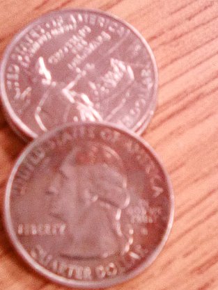 Red-Tint-On-2000-New-Hampshire-Quarter-Obverse,-Green-Tint-On-Reverse.-Caus