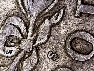 1921-S/?-Morgan;-Can't-Make-Out-What's-Under-The-MM
