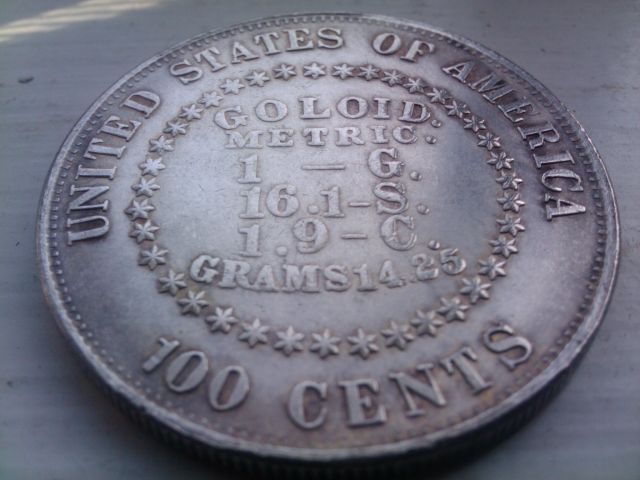 1879-Morgan-With-Goloid-Metric-On-Reverse-Side