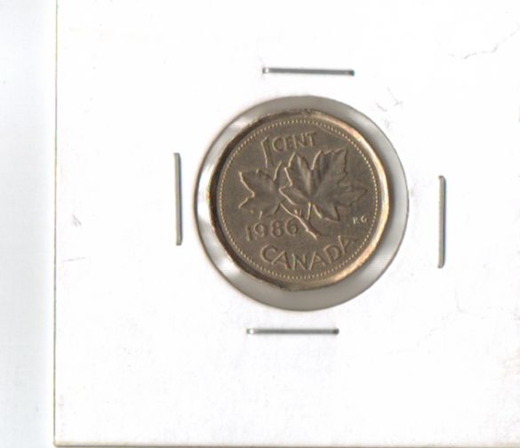 1986-Penny-On-A-Dime-Planchet