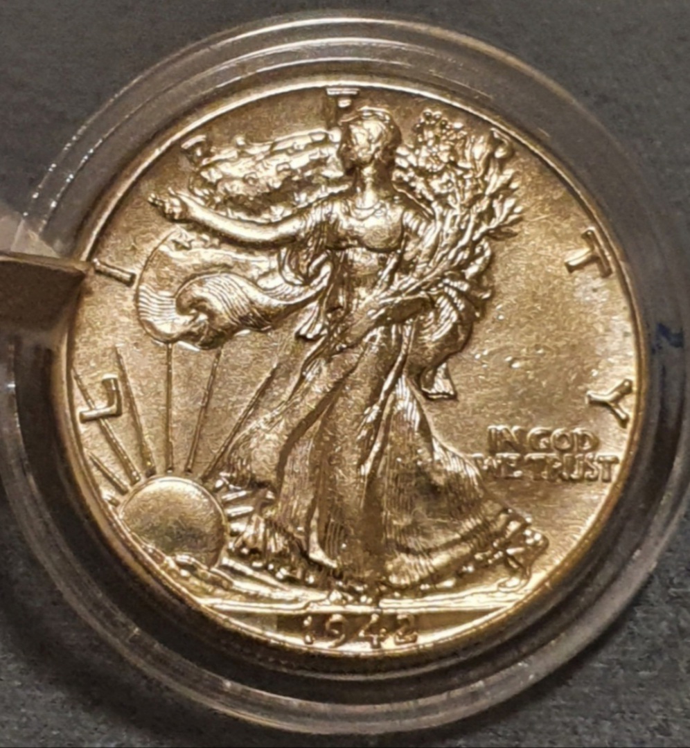 Unc-Walking-Liberty-Cleaned-Or-No?