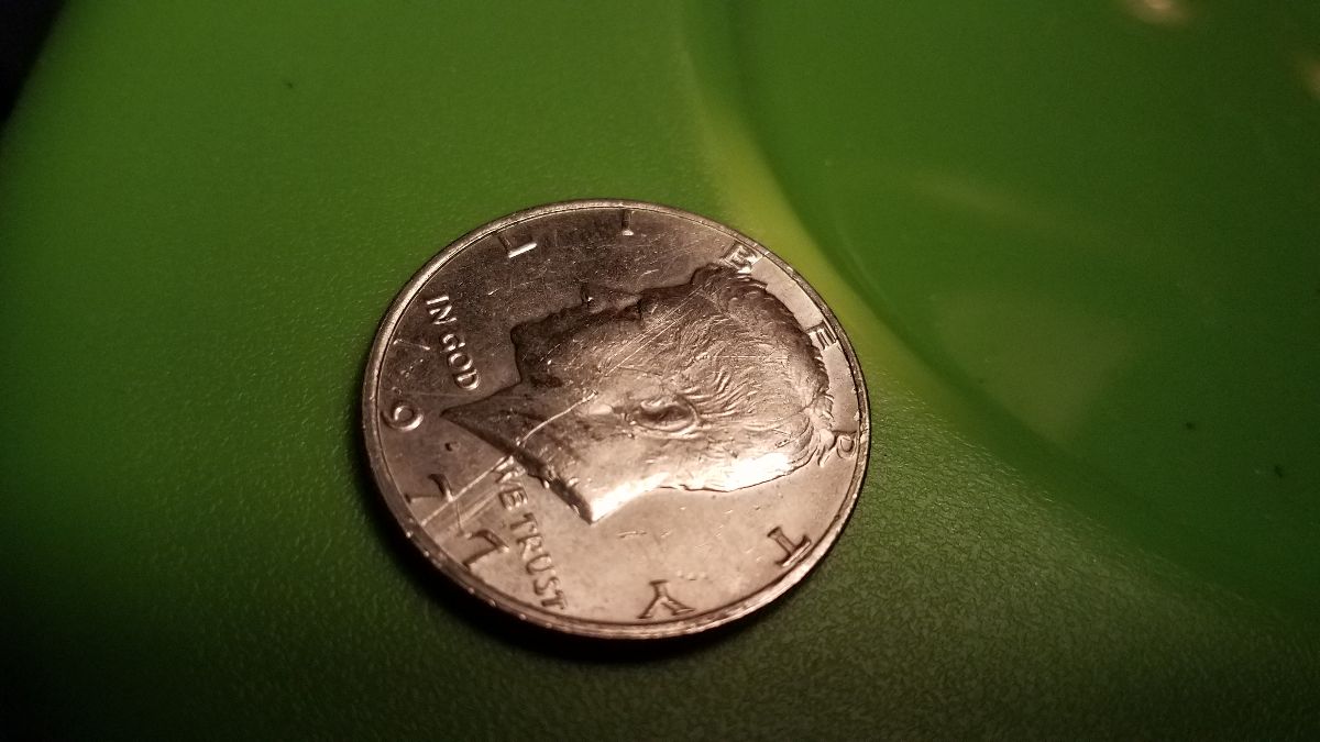 Kennedy-Half-Dollar-Strike-Through-And-Other-Errors,-I-Can't-Tell-For-Sure
