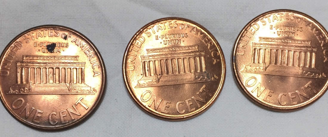 1995-Penny-DD—black-Spots-On-Otherwise-Nice-Coins