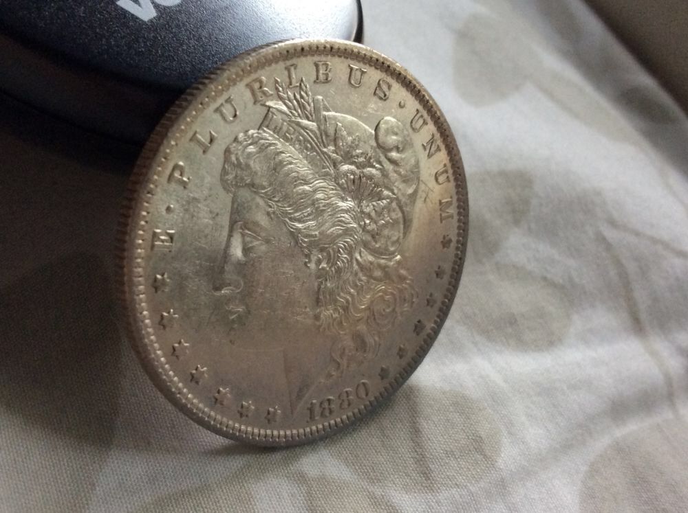 1880-O-Morgan-For-Grading-In-Hand.