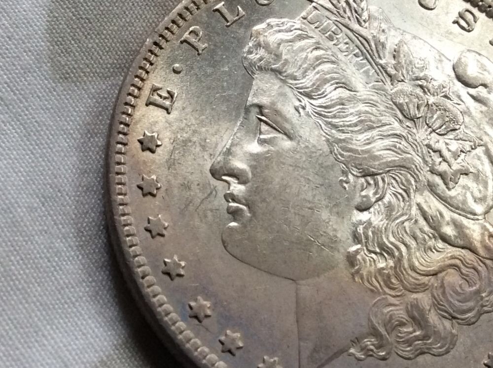 1880-O-Morgan-For-Grading-In-Hand.