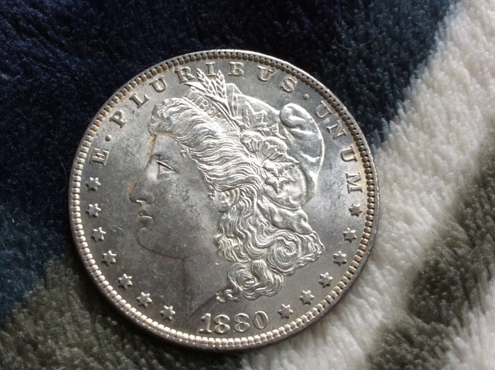 1880-O-Morgan-In-Hand-For-Grading