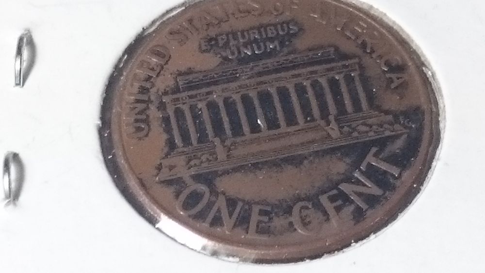 Strange-2001-Cent-Planchet