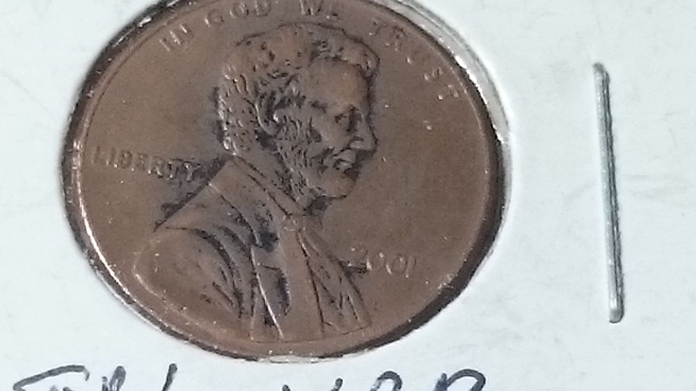 Strange-2001-Cent-Planchet