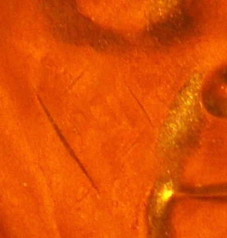 Monroe-Dollar-Letter-On-Face