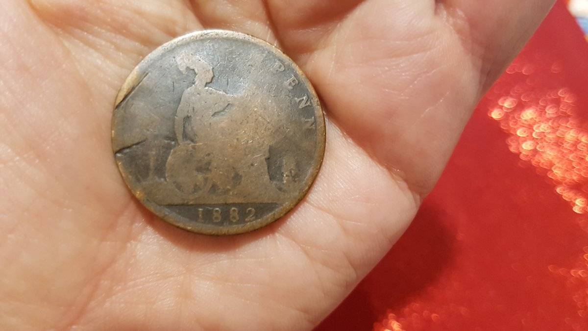 Is-Reg-Engraved-On-A-Coin-Supposed-To-Mean-Or-Stand-For-Something?