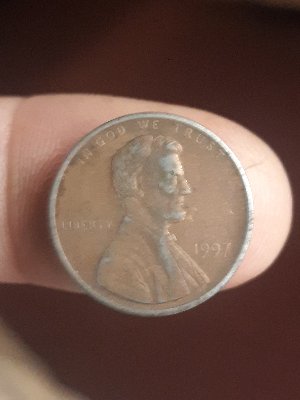 I-Think-I-Found-A-1997-Penny-No-Mint-Mark-On-A-Dime-Planchet