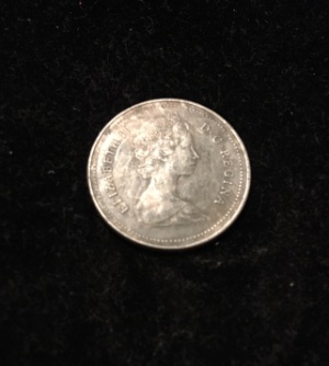 1980-Near-Or-Far-Beaded-Canadian-Quarter?