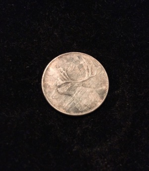 1980-Near-Or-Far-Beaded-Canadian-Quarter?