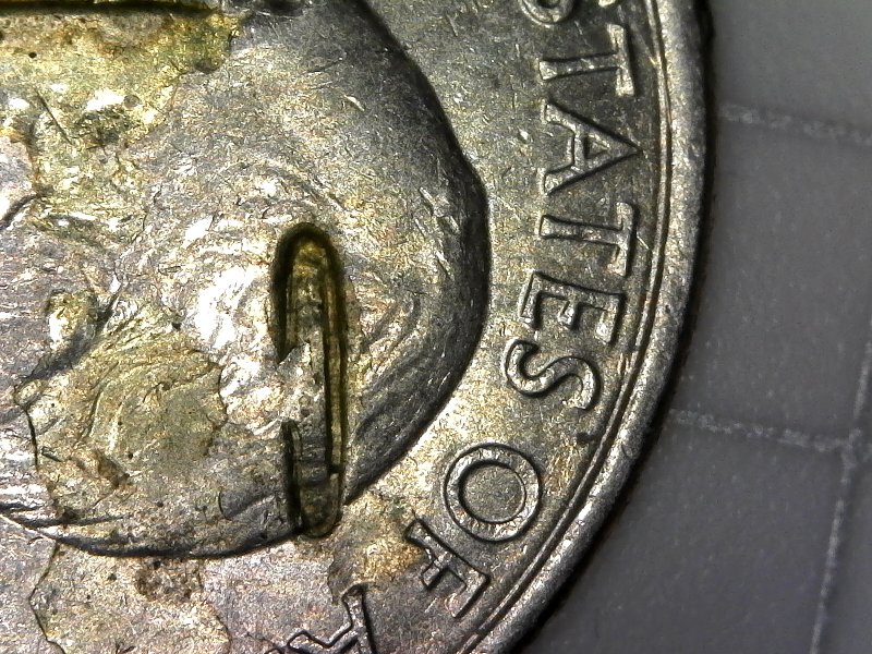 2012-Quarter-With-Damage-And-Or-Massive-Strike-Through