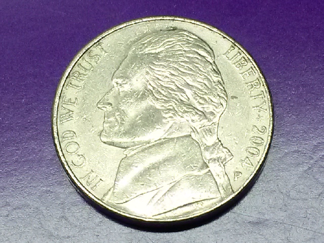 I-Have-A2004-P-Nickel-Are-These-Die-Chips-On-The-N-And-S-?