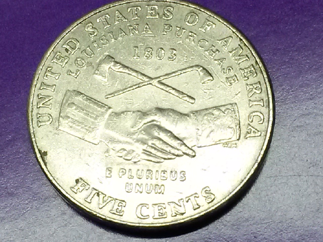I-Have-A2004-P-Nickel-Are-These-Die-Chips-On-The-N-And-S-?