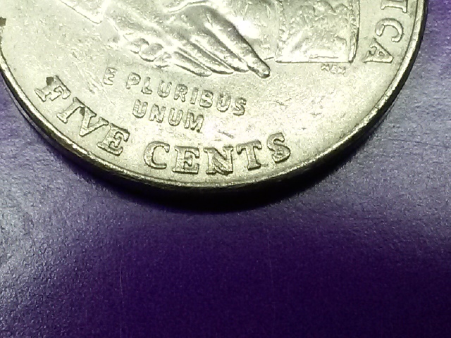 I-Have-A2004-P-Nickel-Are-These-Die-Chips-On-The-N-And-S-?