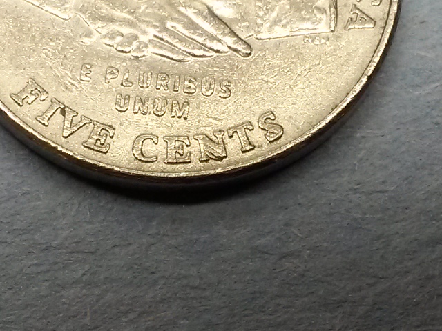 HI-I-Am-Wondering-Is-This-Doubling-And-With-Die-Chips-On-This-2004-P-Nickel
