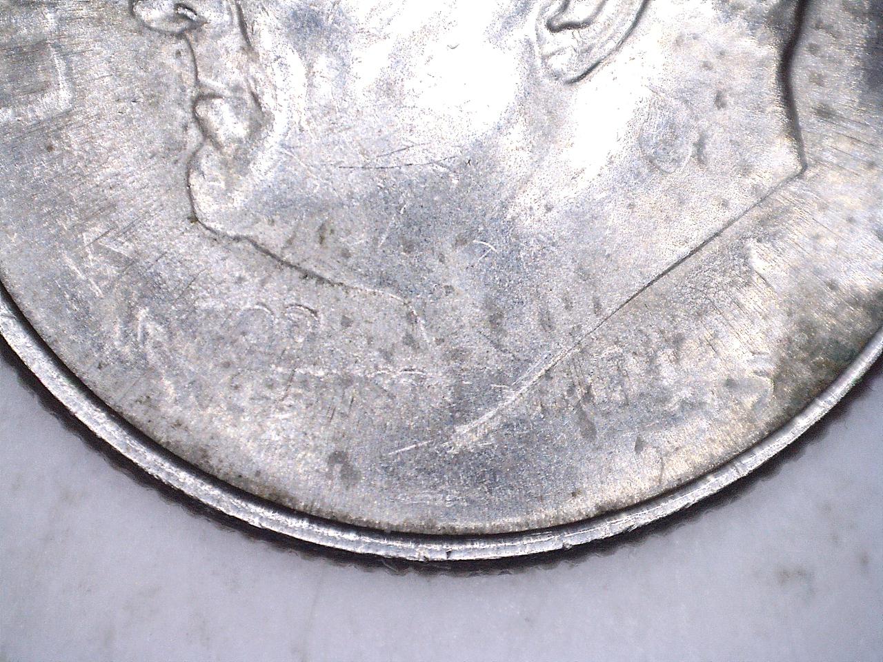 2015-Strike-Through-Dime