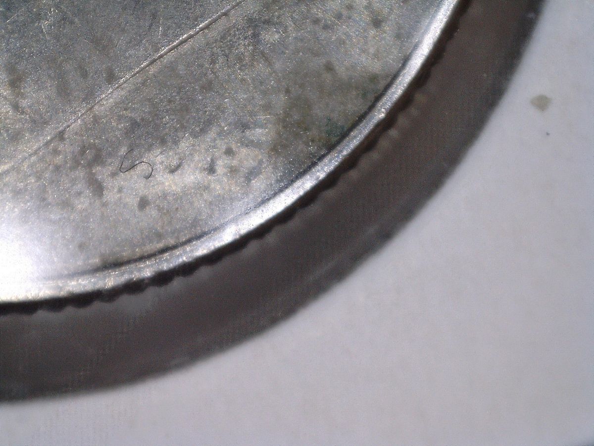 2015-Strike-Through-Dime