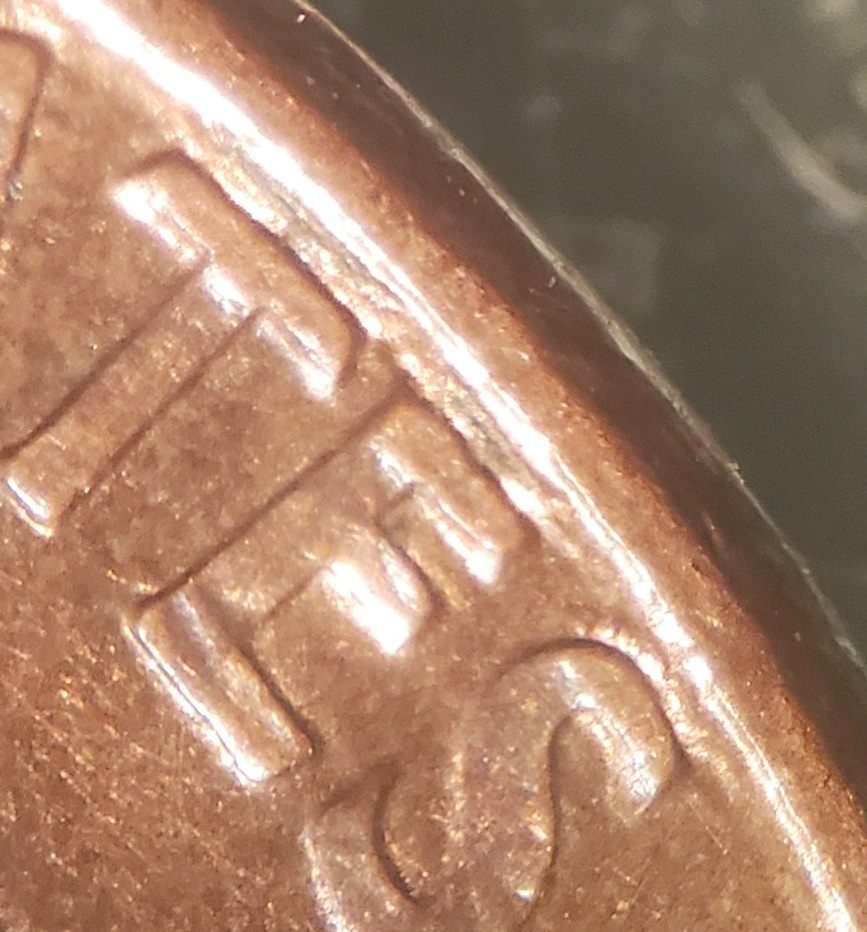 1990-Penny-Raised-Lines-Above-United-States-Of-America