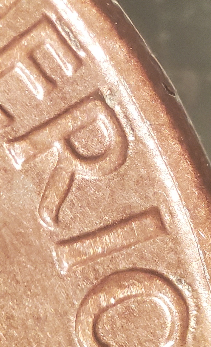 1990-Penny-Raised-Lines-Above-United-States-Of-America