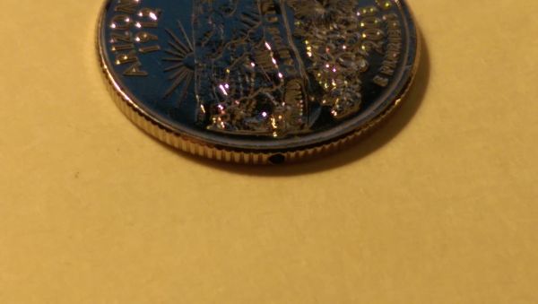 Plated-State-Quarter-With-Holes-In-The-Edges?