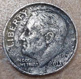 Error-Dime?-2012-Dime-With-Bulge-On-One-Side-Only.