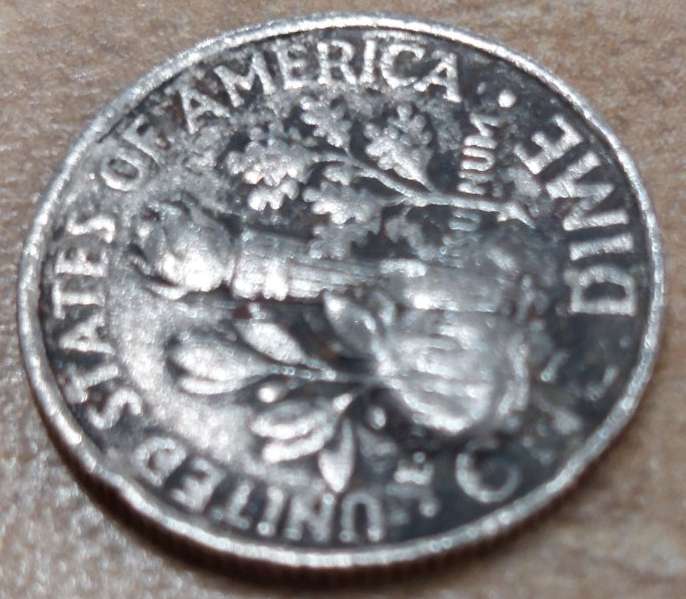 Error-Dime?-2012-Dime-With-Bulge-On-One-Side-Only.