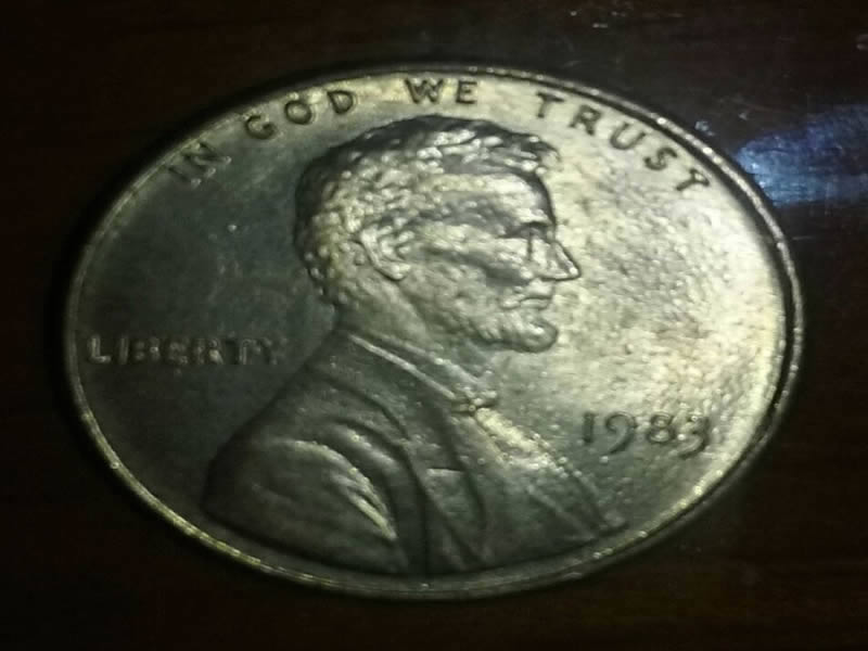 1983-Penny-With-Bubble-Around-Of-Coins