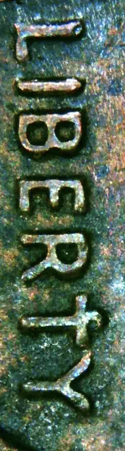 1985-Error-Penny.-The-'T'-In-Liberty-Looks-Like-A-Cross.