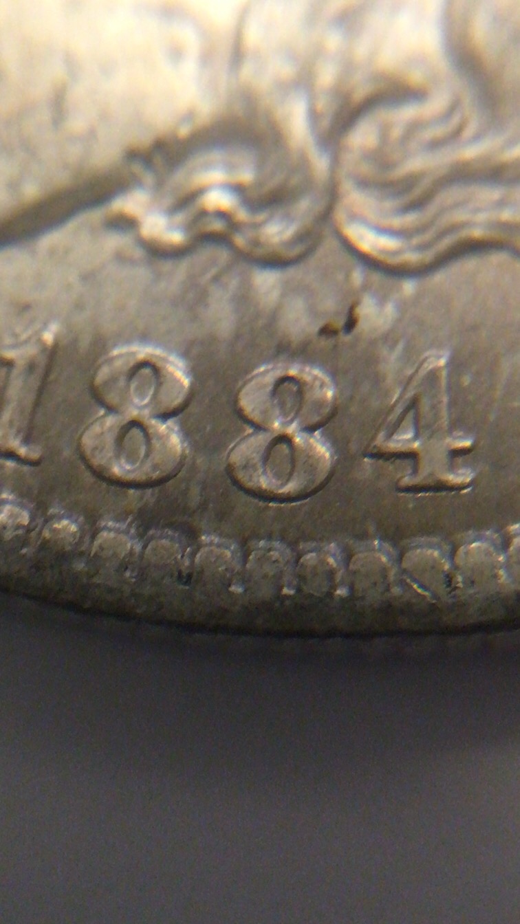 1884-O-Morgan's-Common-Date-Help-Grade