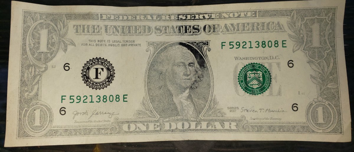 2017-Dollar-Bill.-Washed-/-Worn-Or-Printing-Error