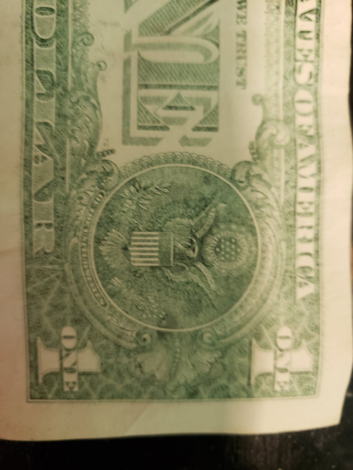 2017-Dollar-Bill.-Washed-/-Worn-Or-Printing-Error