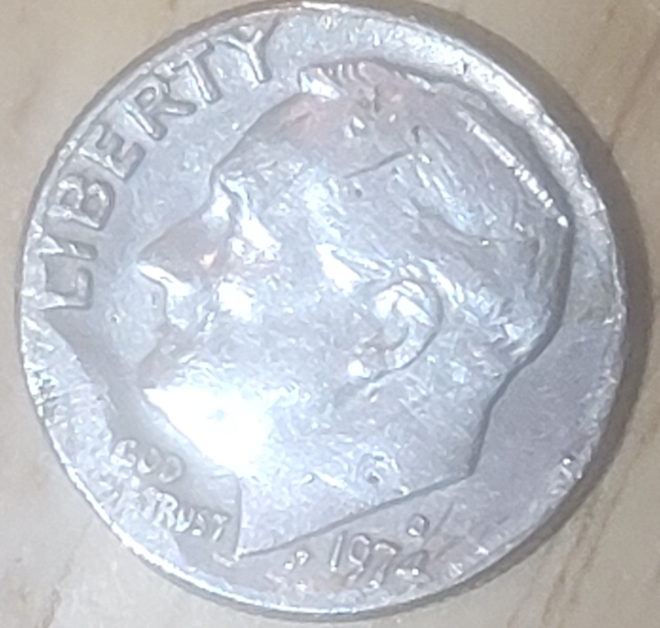 1974-Dime-Odd-Shape-And-Letters-Not-Visible