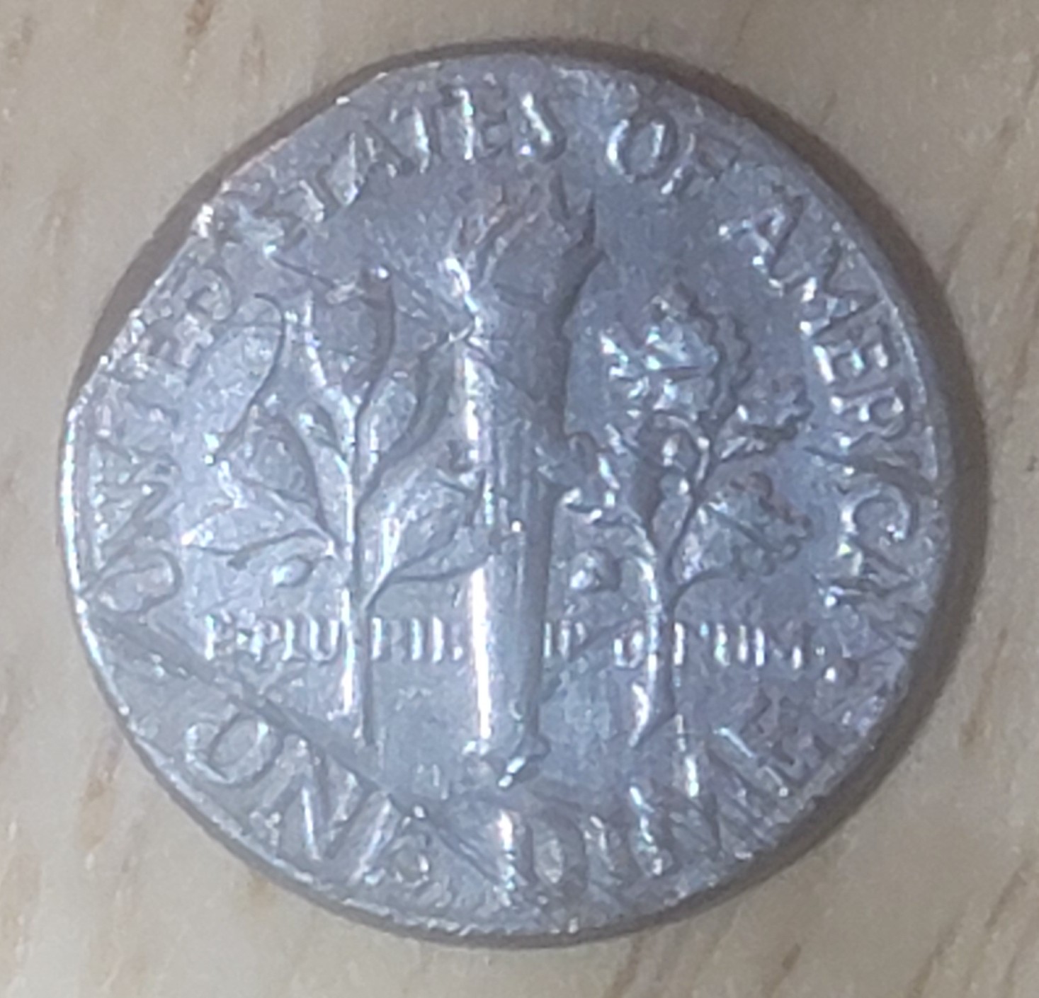 1974-Dime-Odd-Shape-And-Letters-Not-Visible