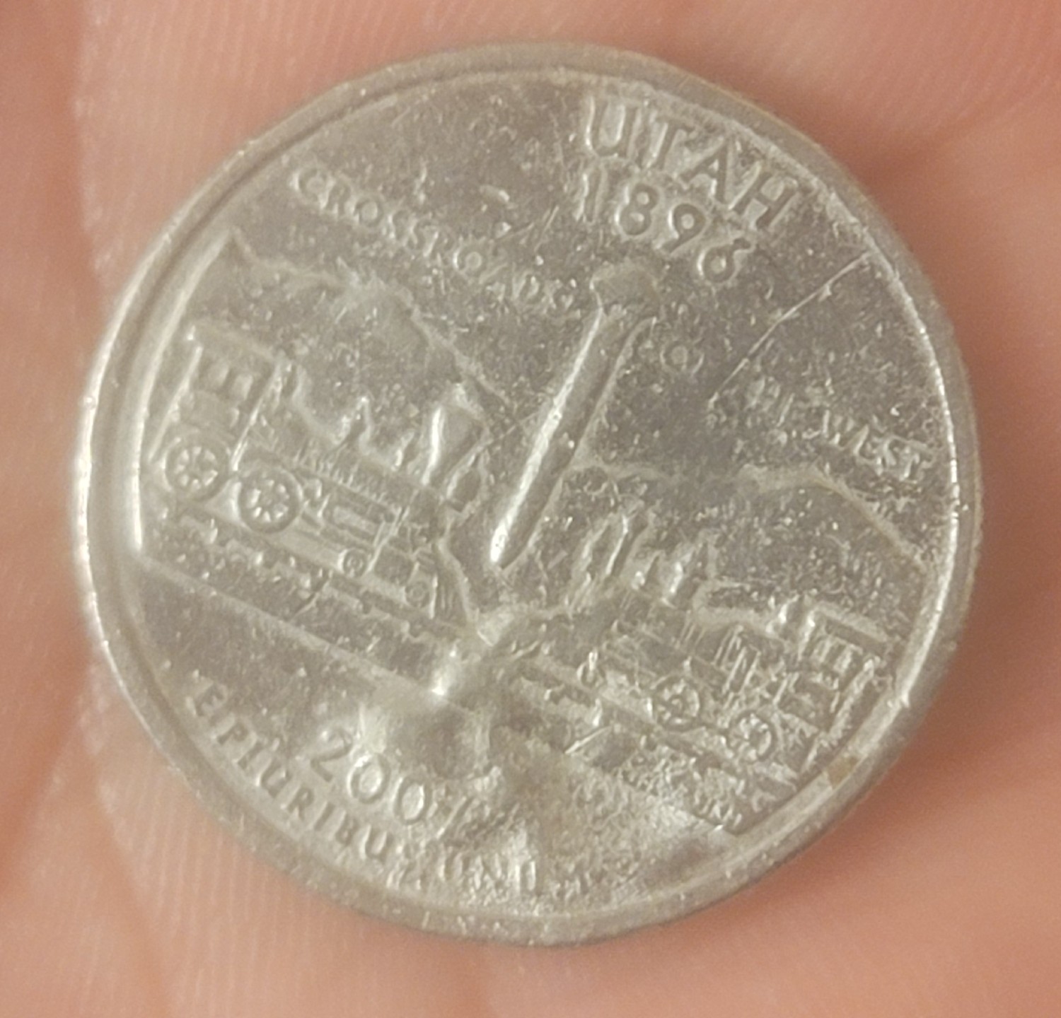 2007-Utah-Quarter-Has-Weird-?melt?-Is-It-Error-Or-Something-Happened-To-It