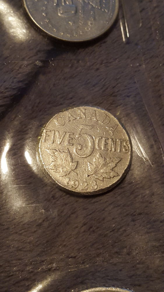 Old-And-Wared-Or-Error-Coin